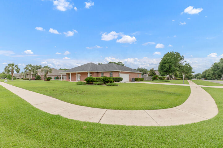 Property Photo:  5552 Frontier Drive  FL 32536 