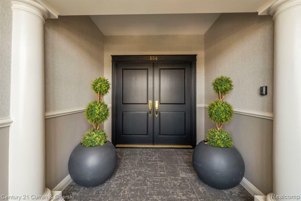 Property Photo: 801 W Ann Arbor Trail 304 MI 48170 1682