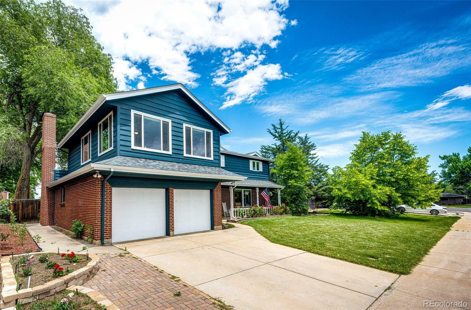 Property Photo: 4645 W Temple Place CO 80236