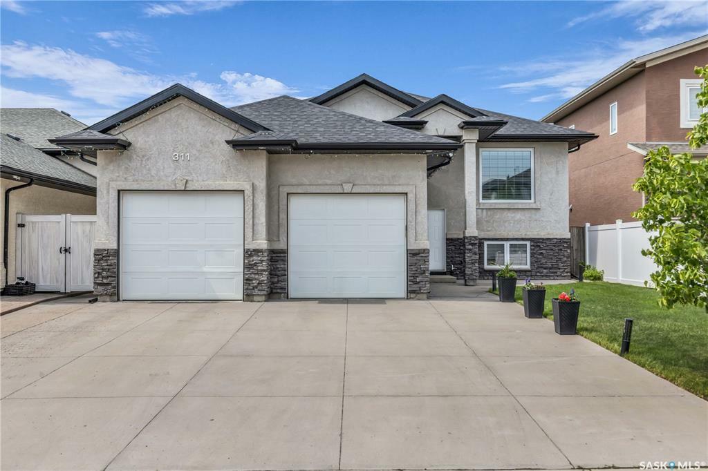 Property Photo: 311 Waters Crescent SK S7W 0A5