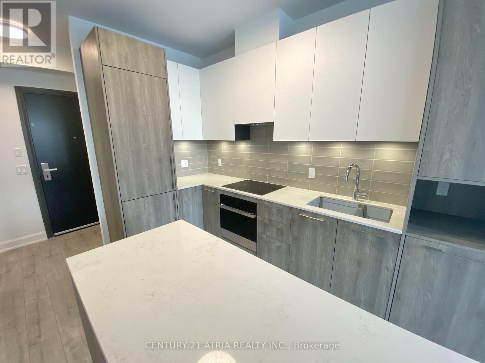 Property Photo: 38 Water Walk Drive 211 ON L3R 6M8