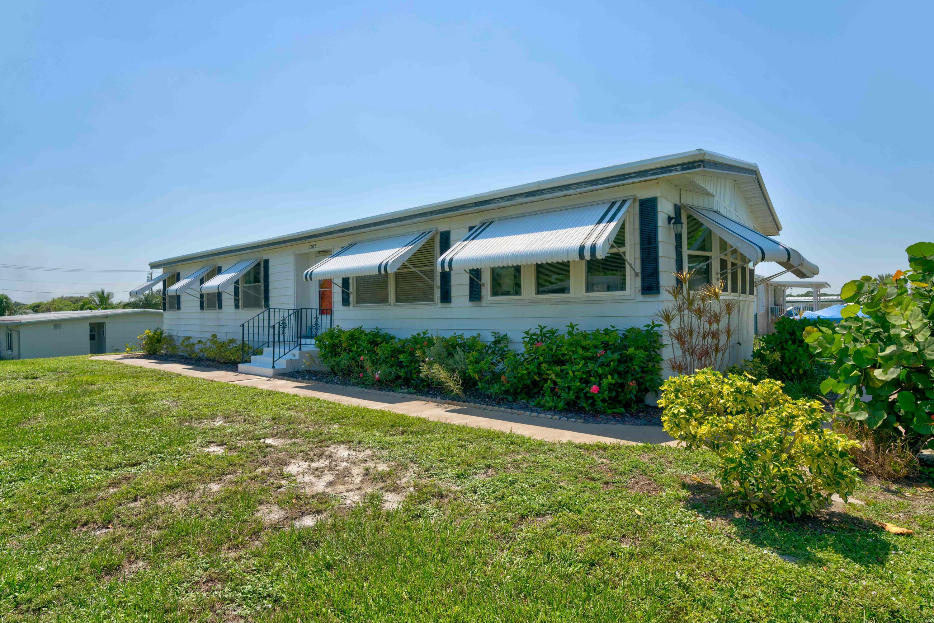Property Photo: 7075 SE Bluebird Circle FL 33455