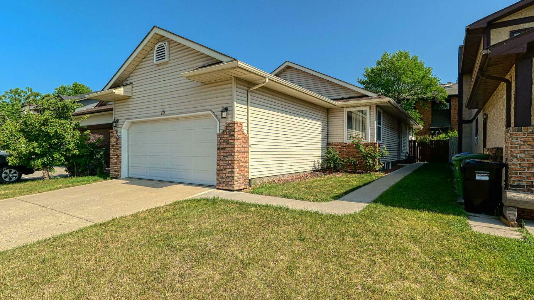Property Photo: 15 Deer Place SE AB T2J 6W6