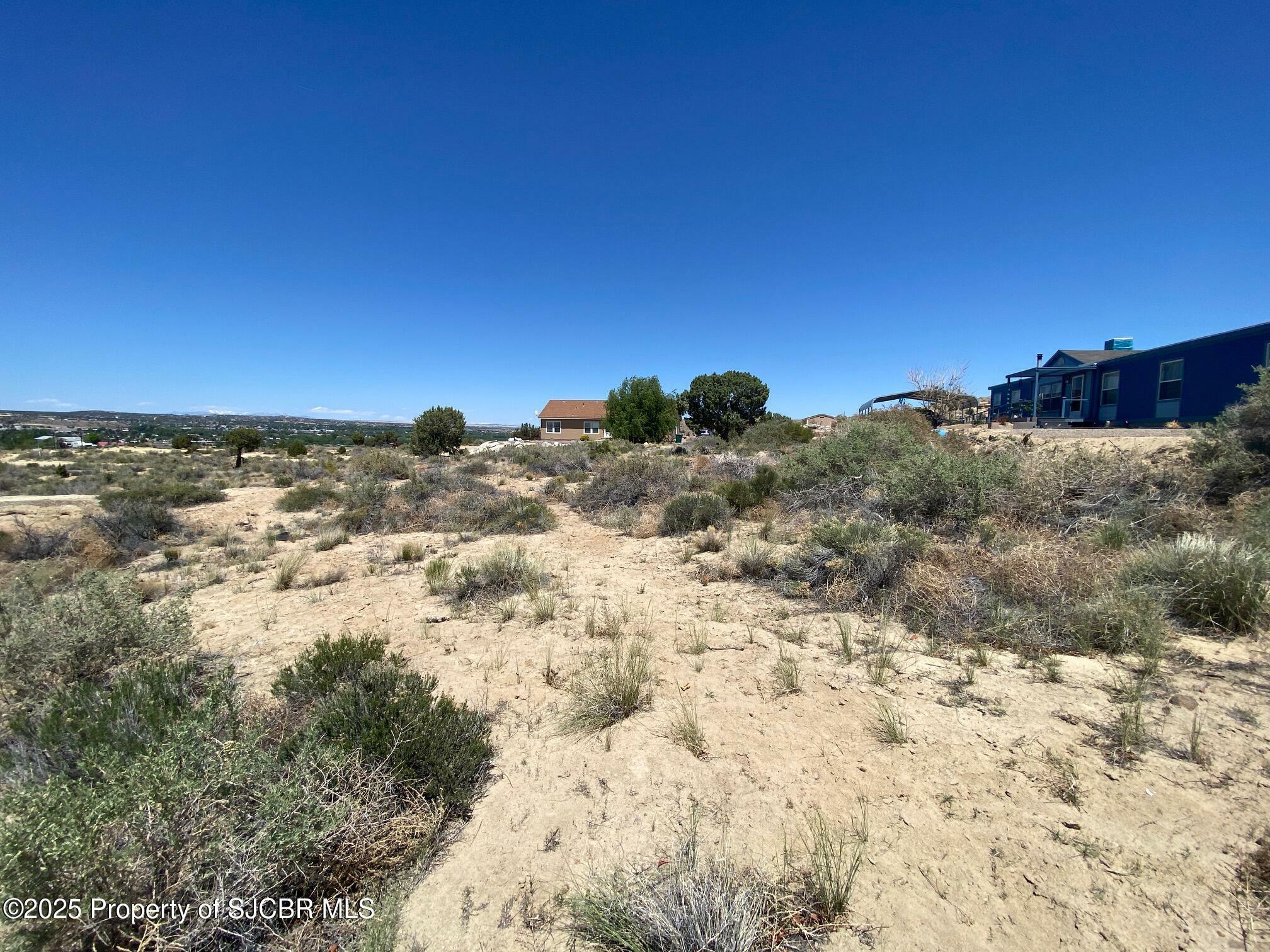 Property Photo: Lots 26-27 .69 Ac Road 34931 NM 87401