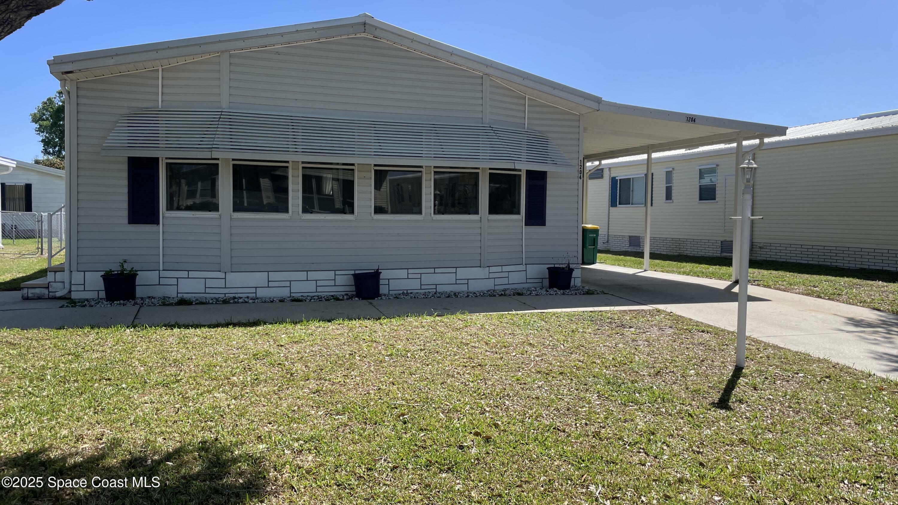 Property Photo: 1204 Calusa Drive FL 32976