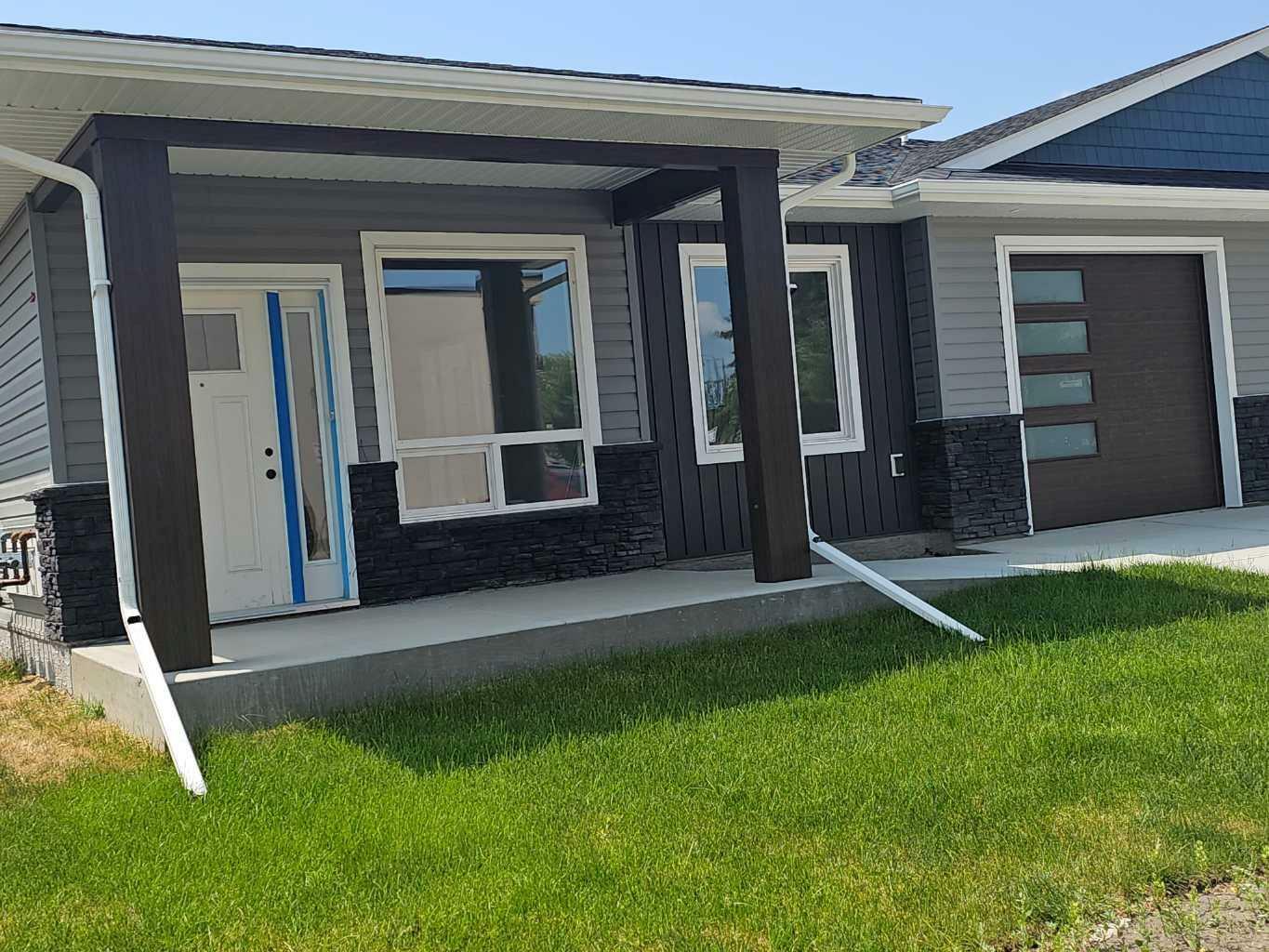 Property Photo: 4738 49A Avenue #3 AB T4L 1N4