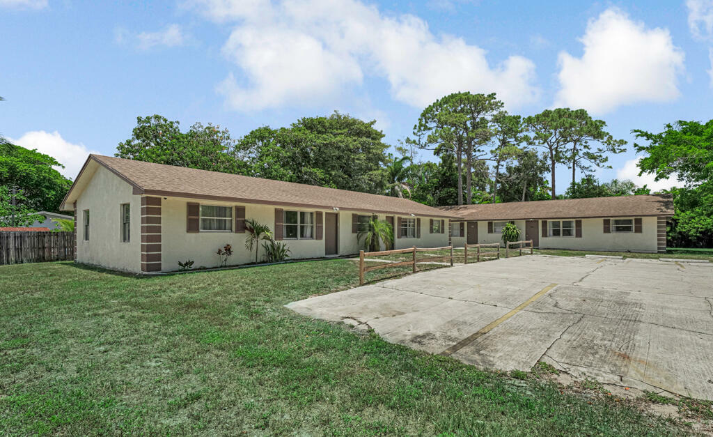 Property Photo:  732 Neil Road 1-4  FL 33415 