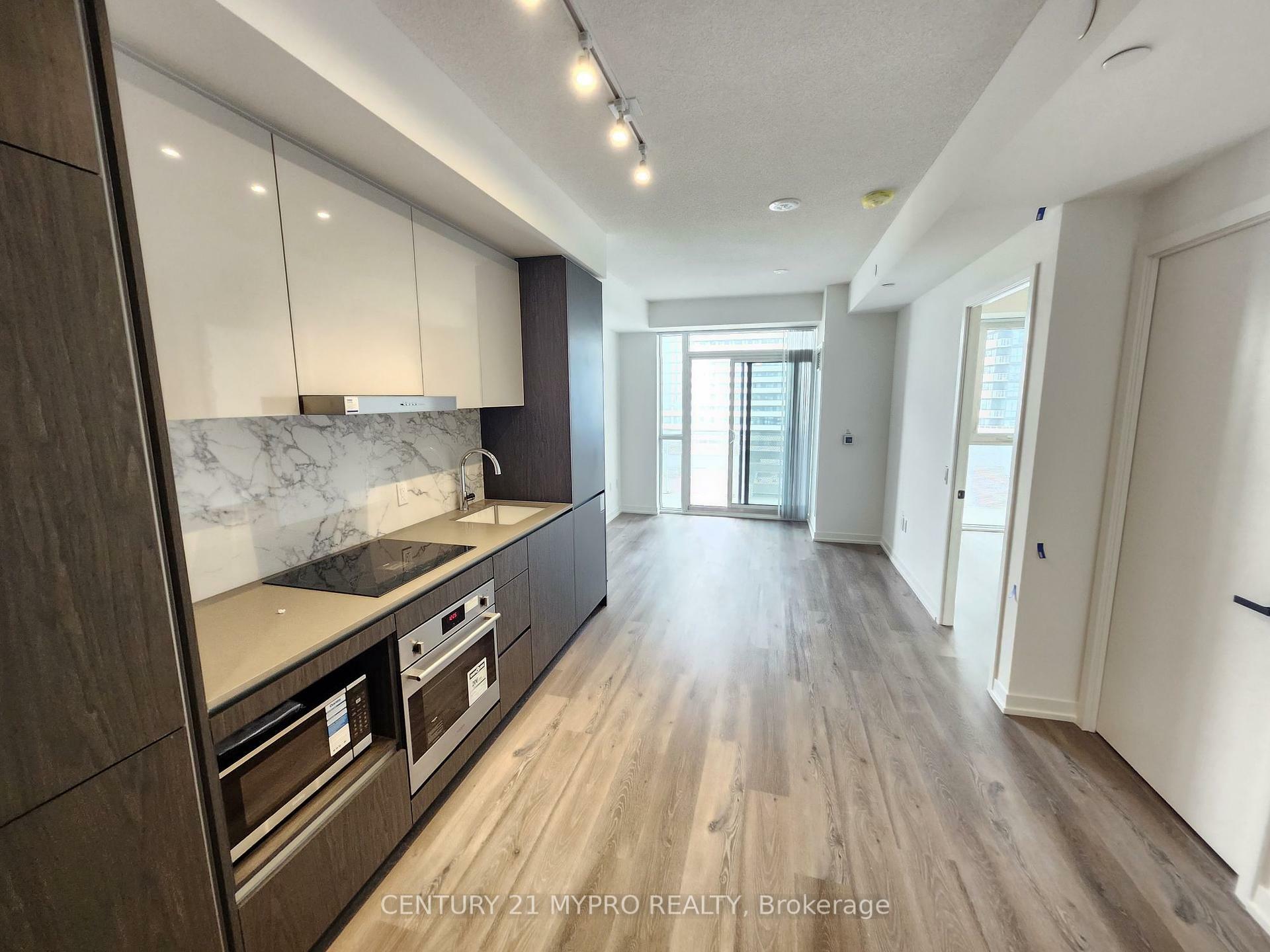 Property Photo: 28 Interchange Way 321 ON L4K 0P8
