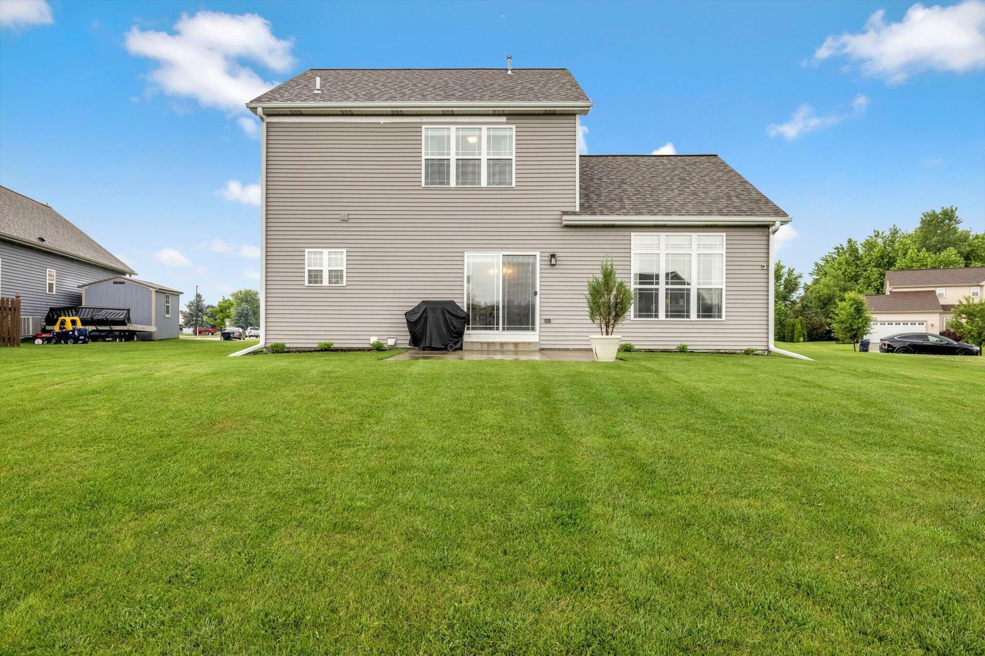 Property Photo: 129 N Wild Flower Ln WI 53121