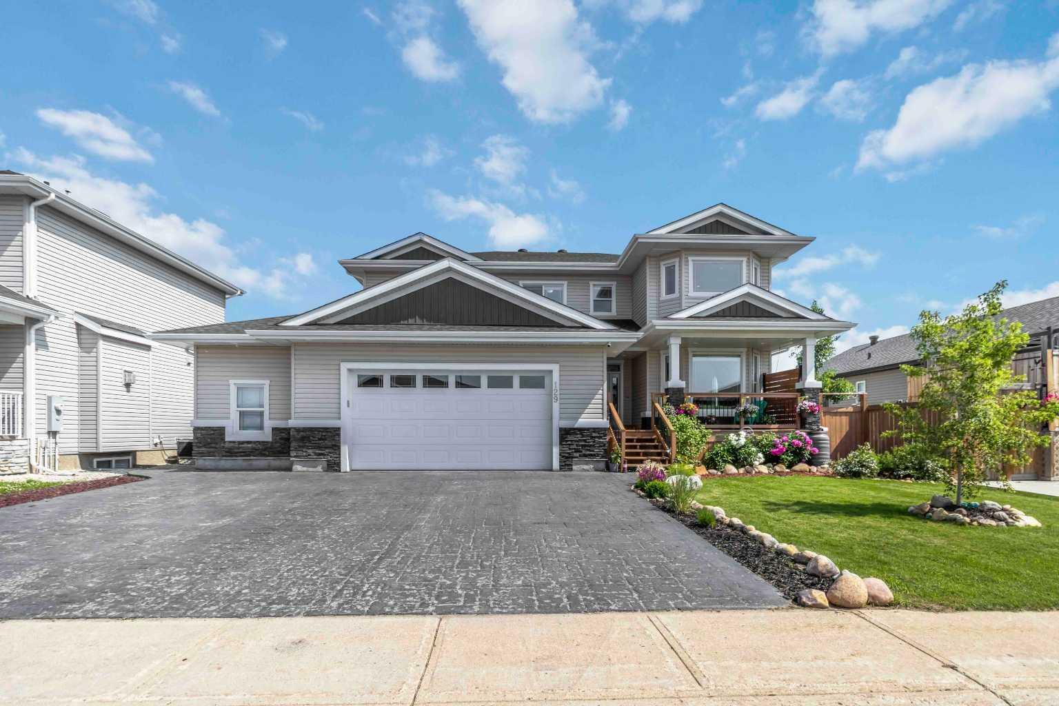 Property Photo: 129 Beaveridge Close AB T9K 2V8