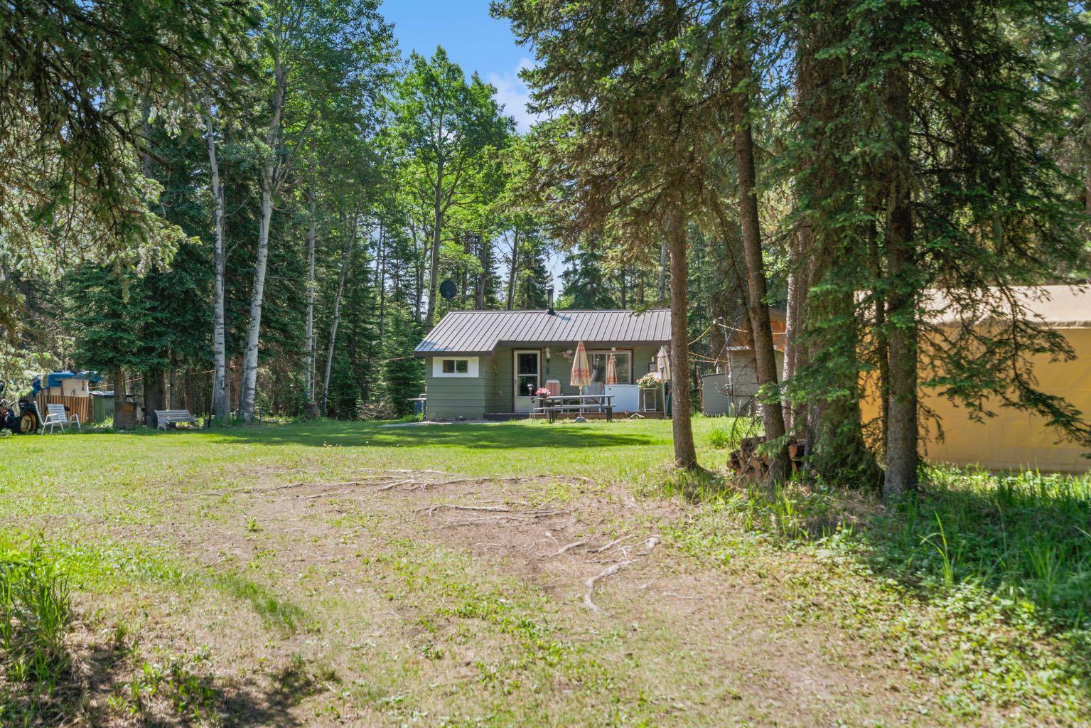 Property Photo: 282226 Range Road 54A AB T4C 2W1