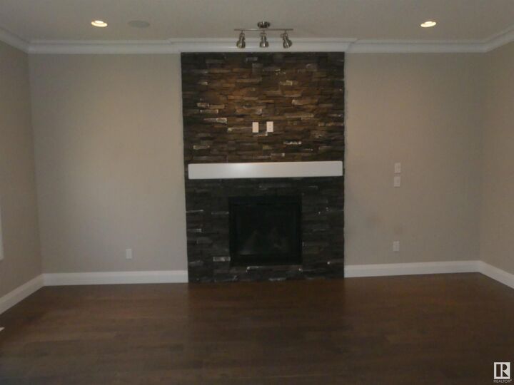 Property Photo:  628 Ortona Way NW  AB T5E 6S9 