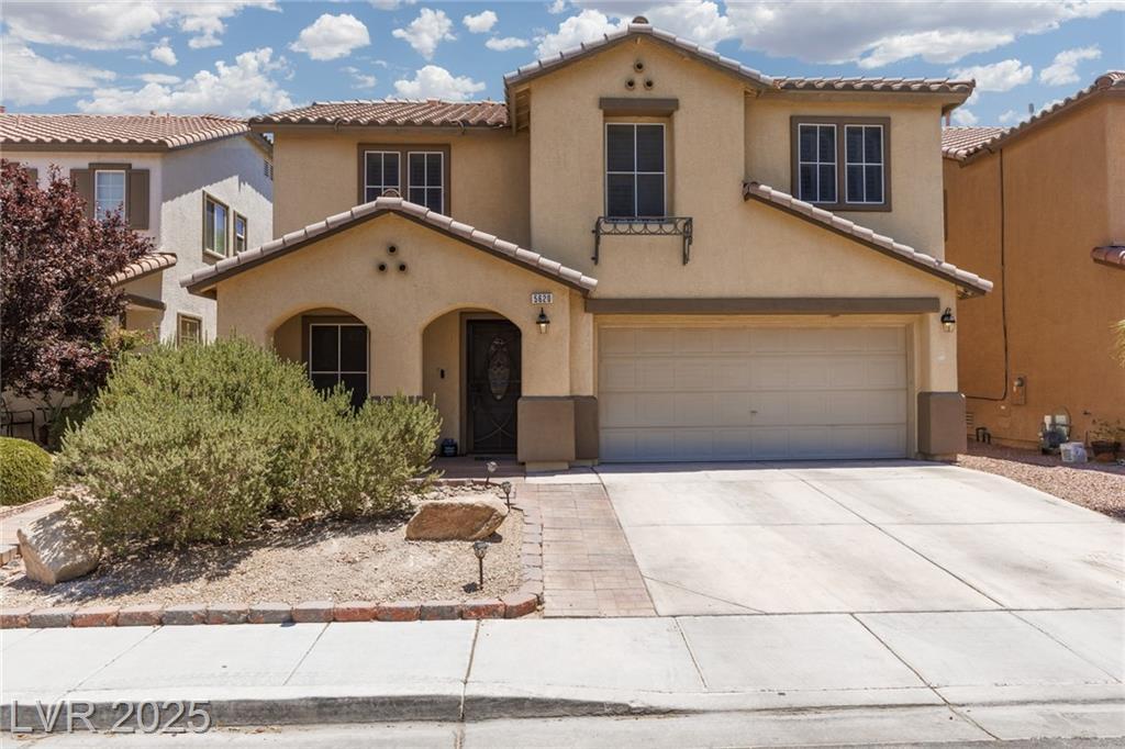 Property Photo:  5620 Siena Rose Street  NV 89031 
