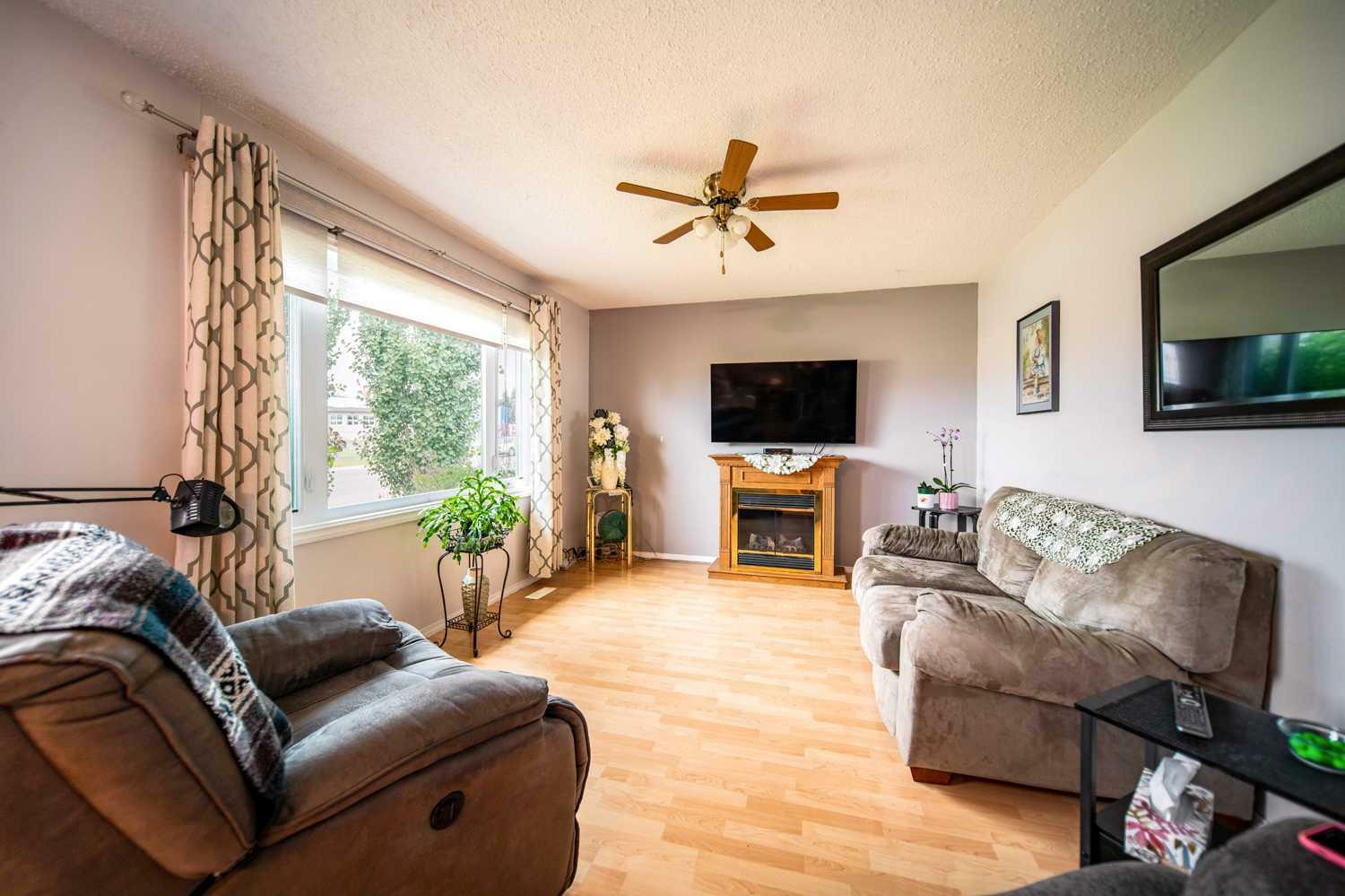 Property Photo: 233 14 Street AB T9W 1G4