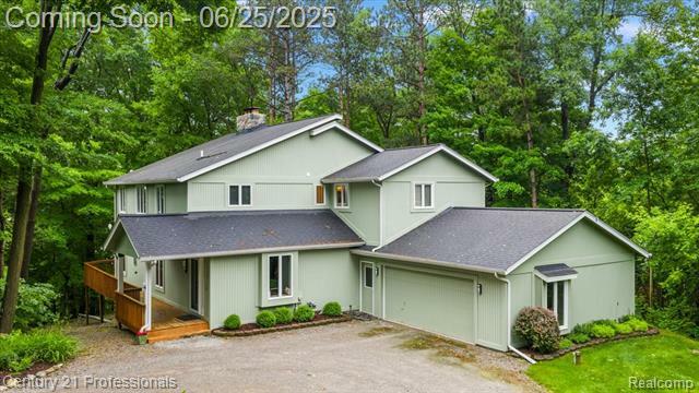 Property Photo:  7340 Deer Lake Road  MI 48346 