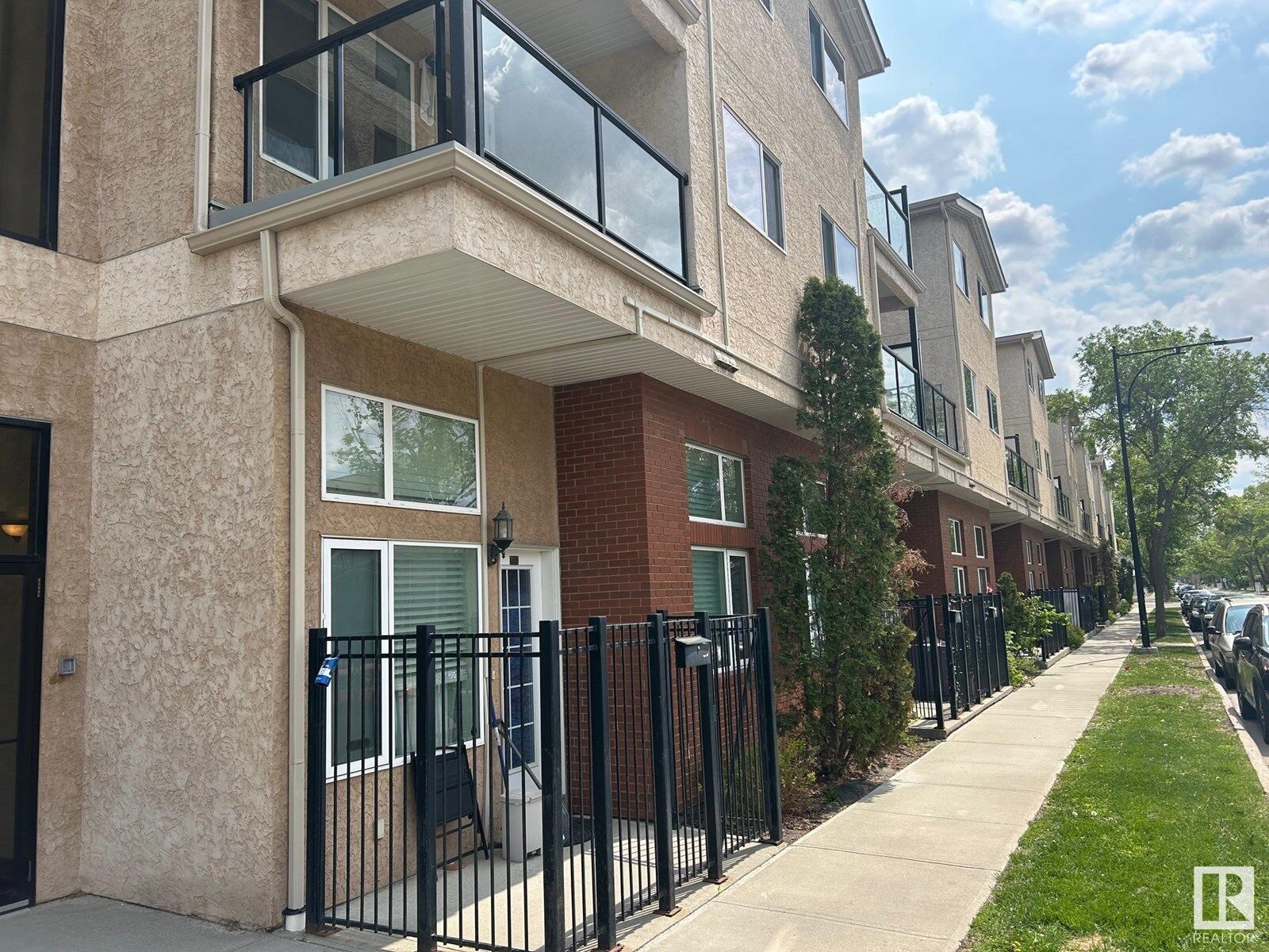 Property Photo:  #213 11033 127 St NW  AB T5M 0T3 