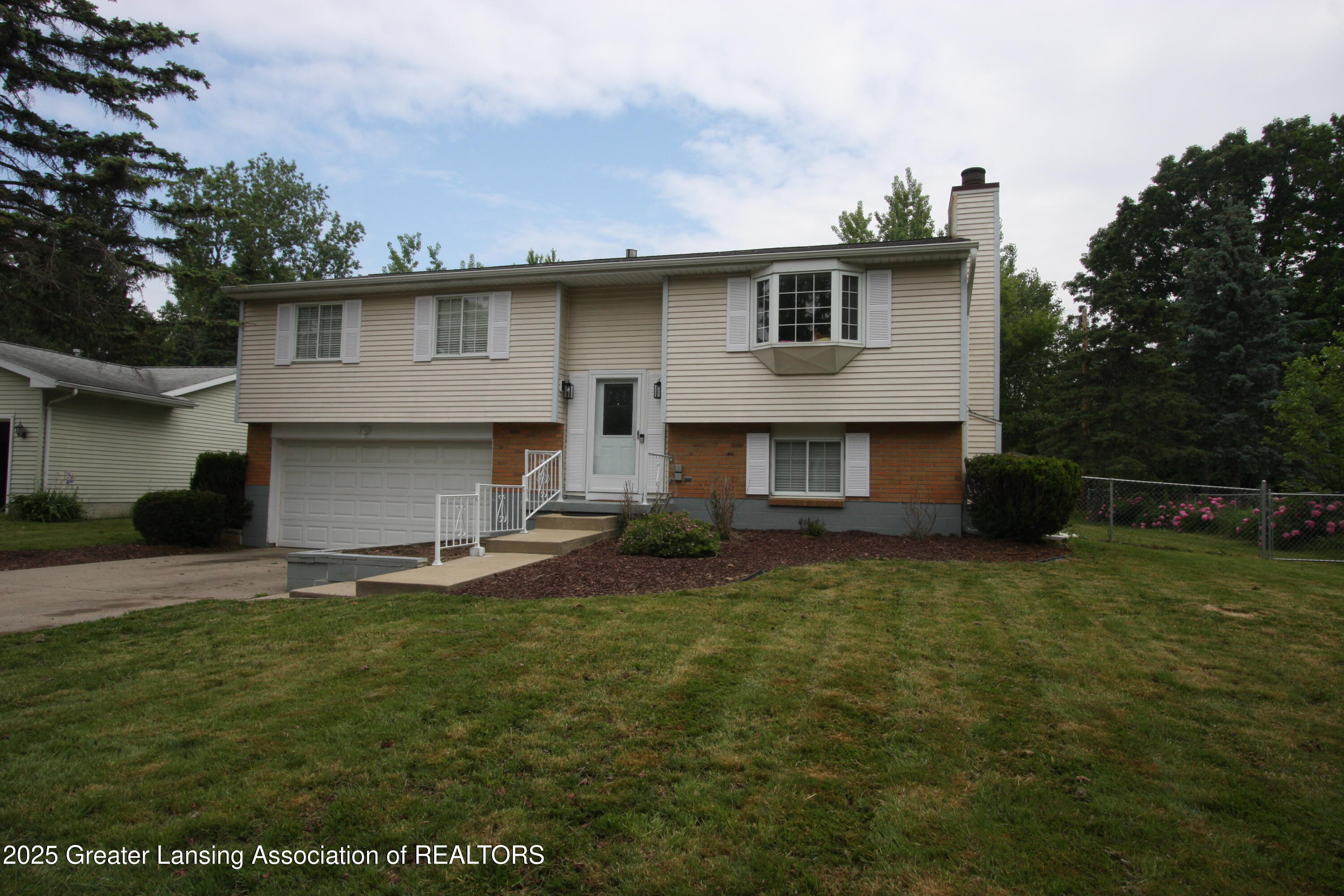 Property Photo: 3231 Stonewood Drive MI 48912