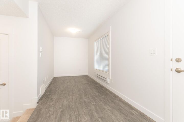 Property Photo: 735 Allard Boulevard SW 14 AB T6W 1A8