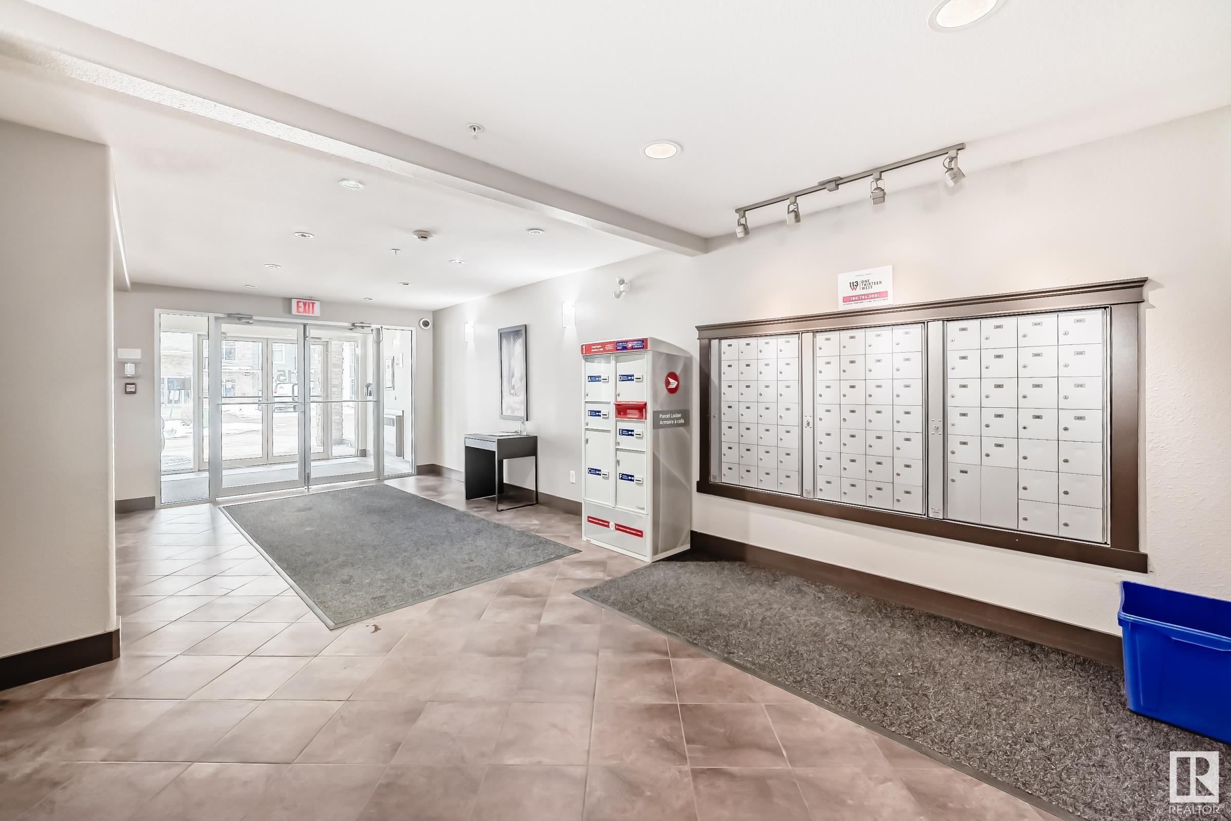 Property Photo: 11615 Ellerslie Road SW 314 AB T6W 0J3
