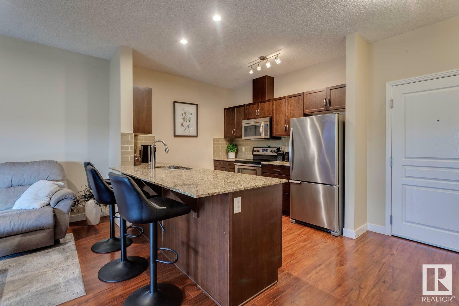 Property Photo: 2045 Grantham Court NW 426 AB T5T 3X6