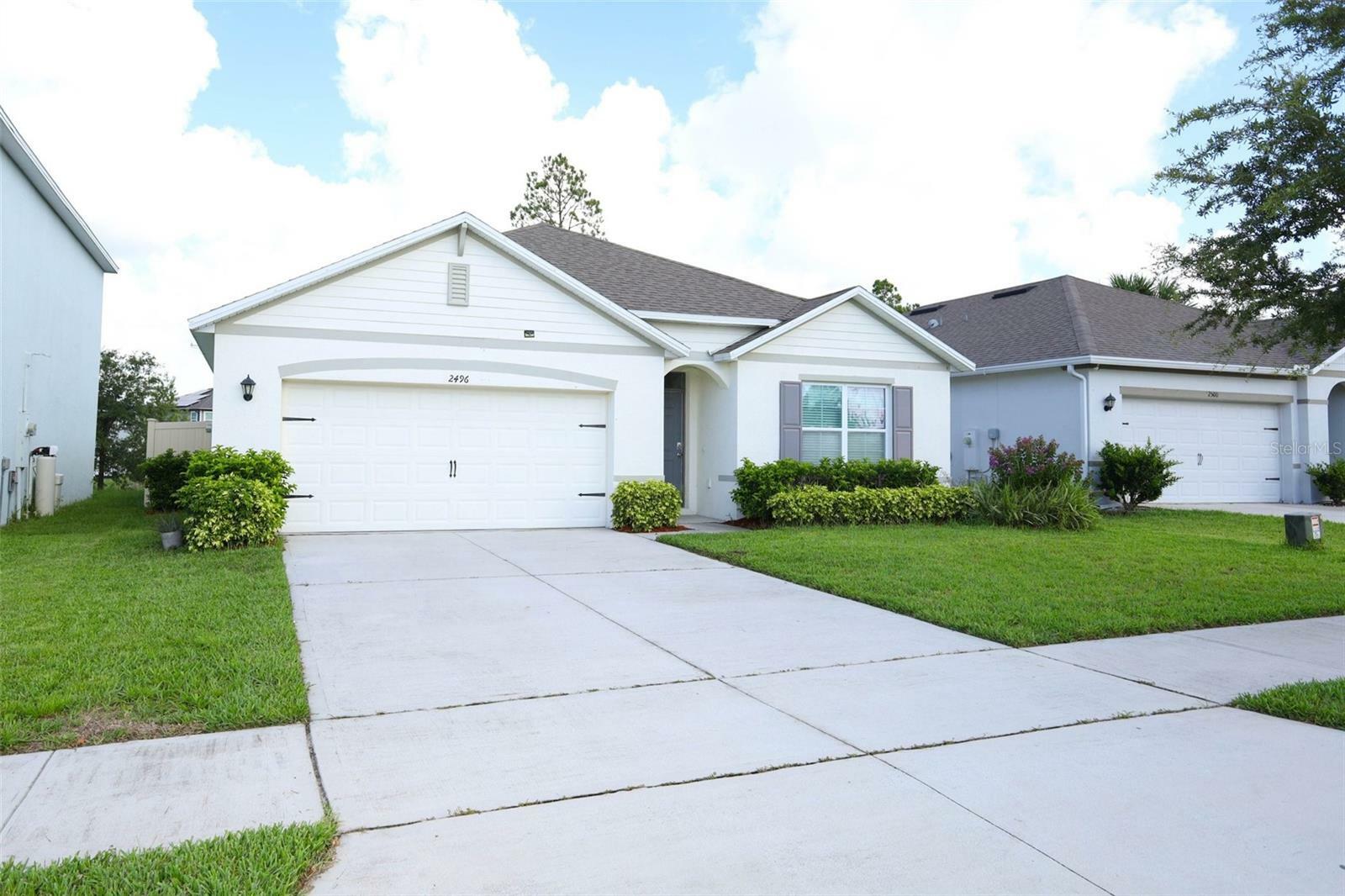 Property Photo: 2496 White Poppy Drive FL 34747