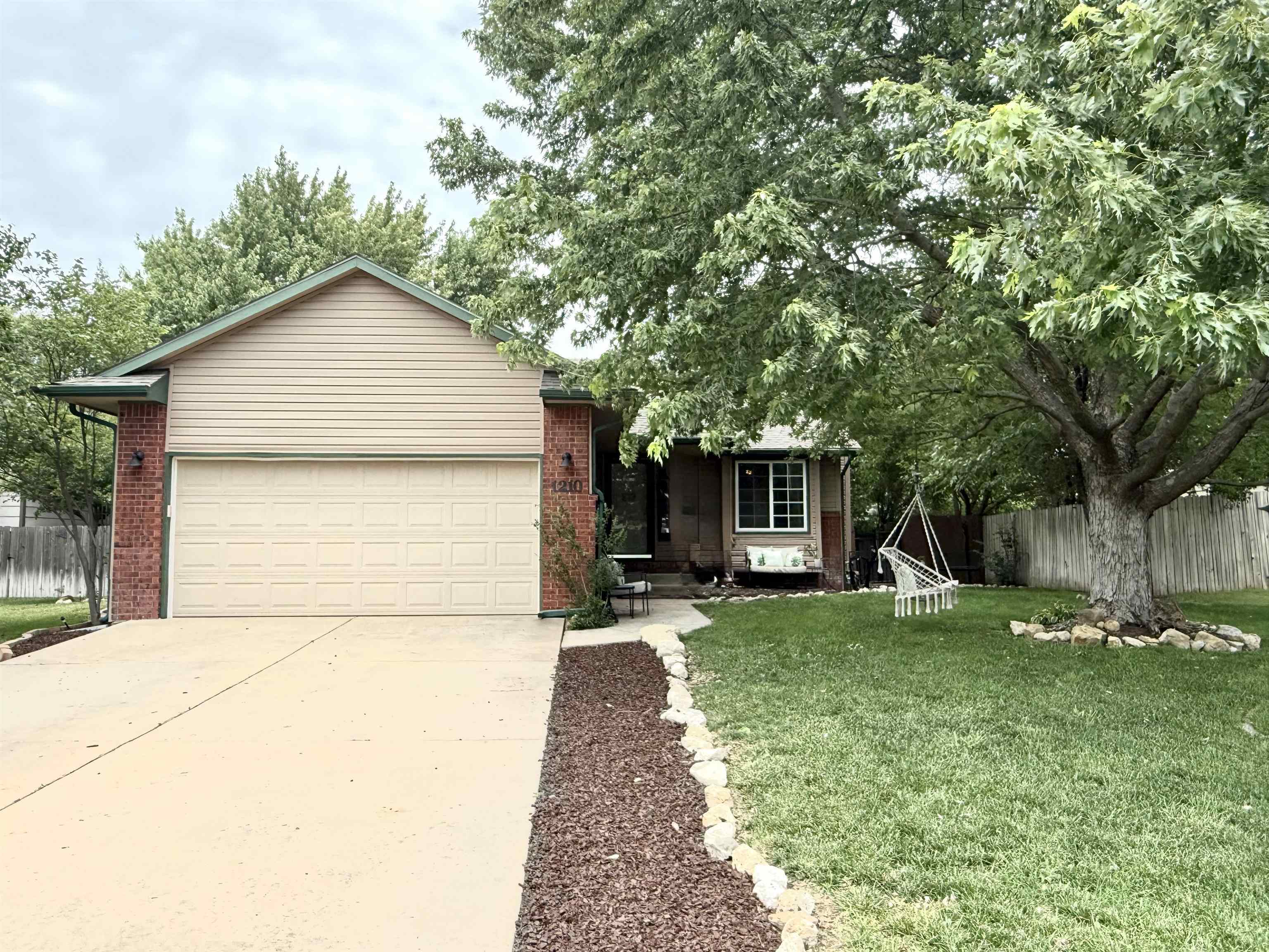 Property Photo: 1210 E Harvest Ln KS 67052