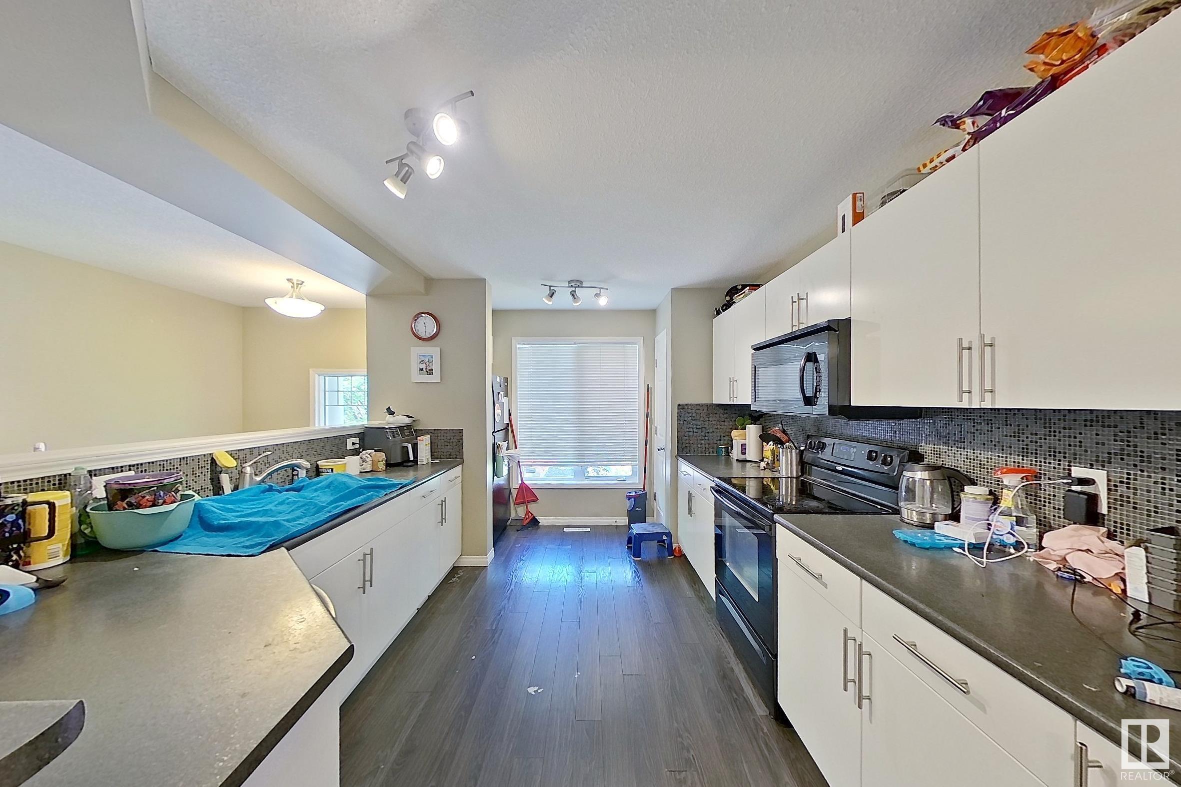 Property Photo: 1641 Towne Centre Boulevard NW AB T6R 0S3
