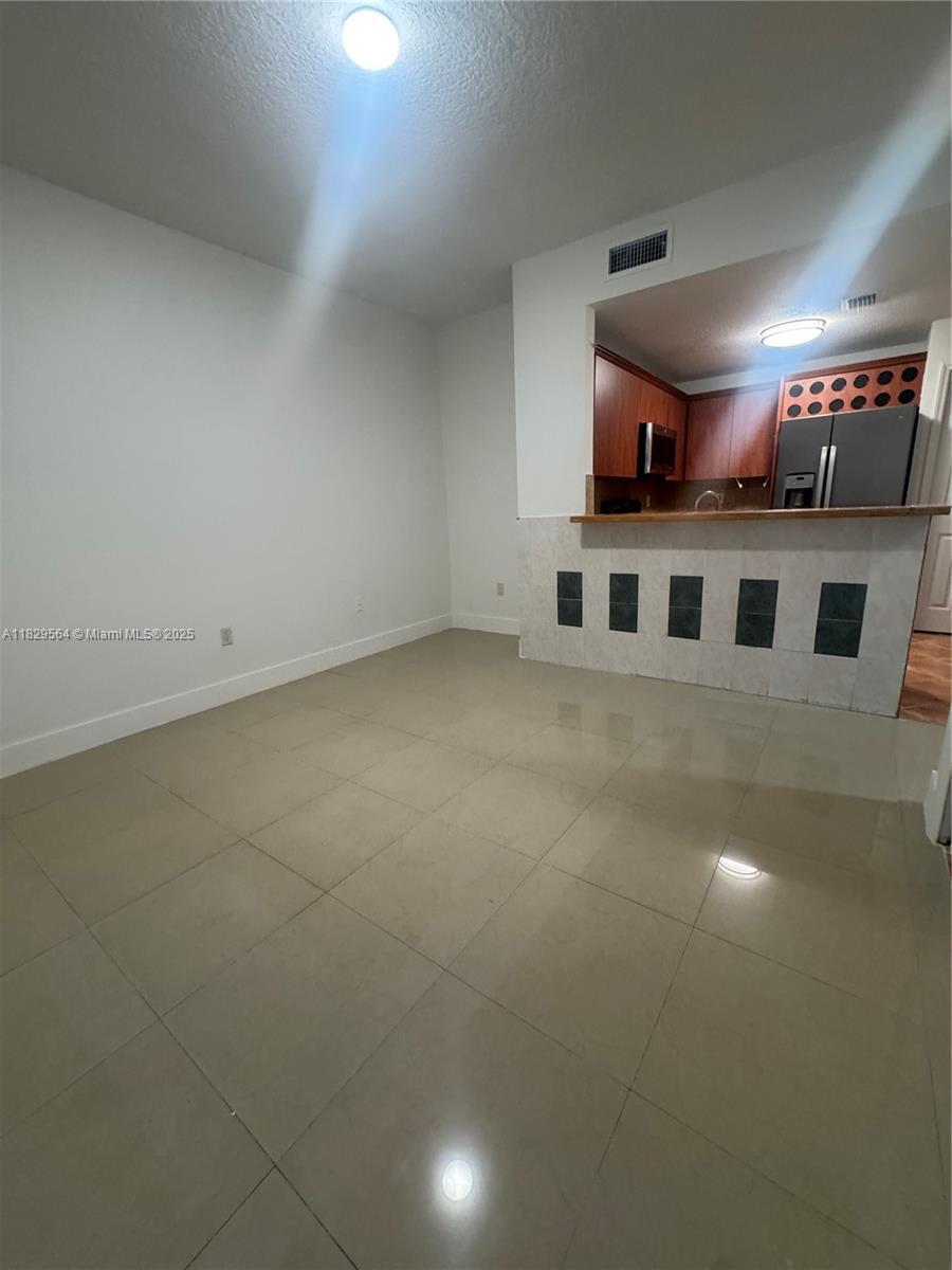 Property Photo: 6141 NW 115th Pl 355 FL 33178