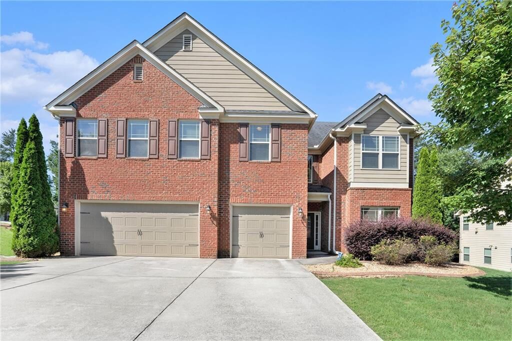 Property Photo: 5689 Woodland Greens Road GA 30135