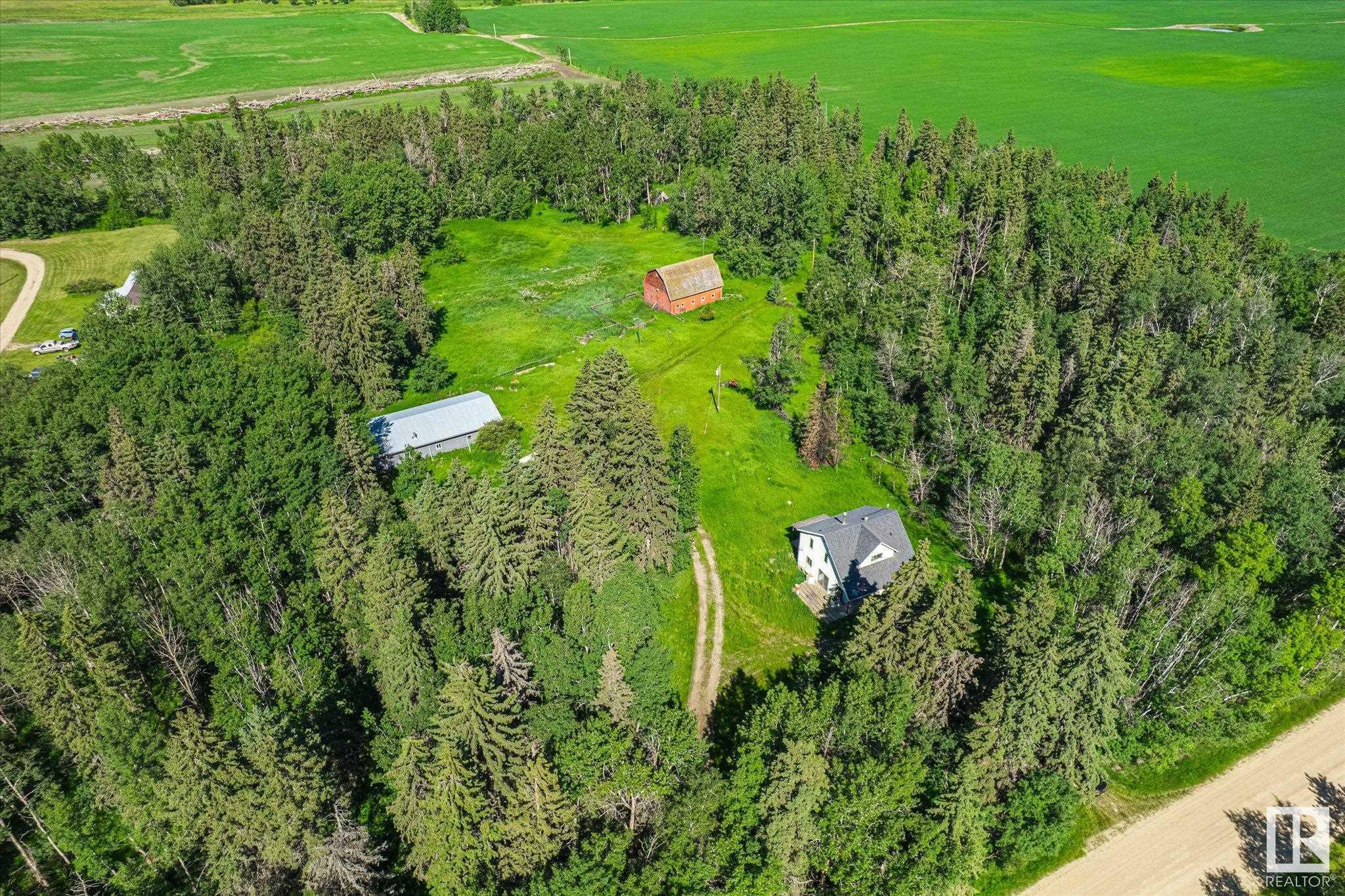Property Photo:  452078 Rge Road 275  AB T0C 0C0 