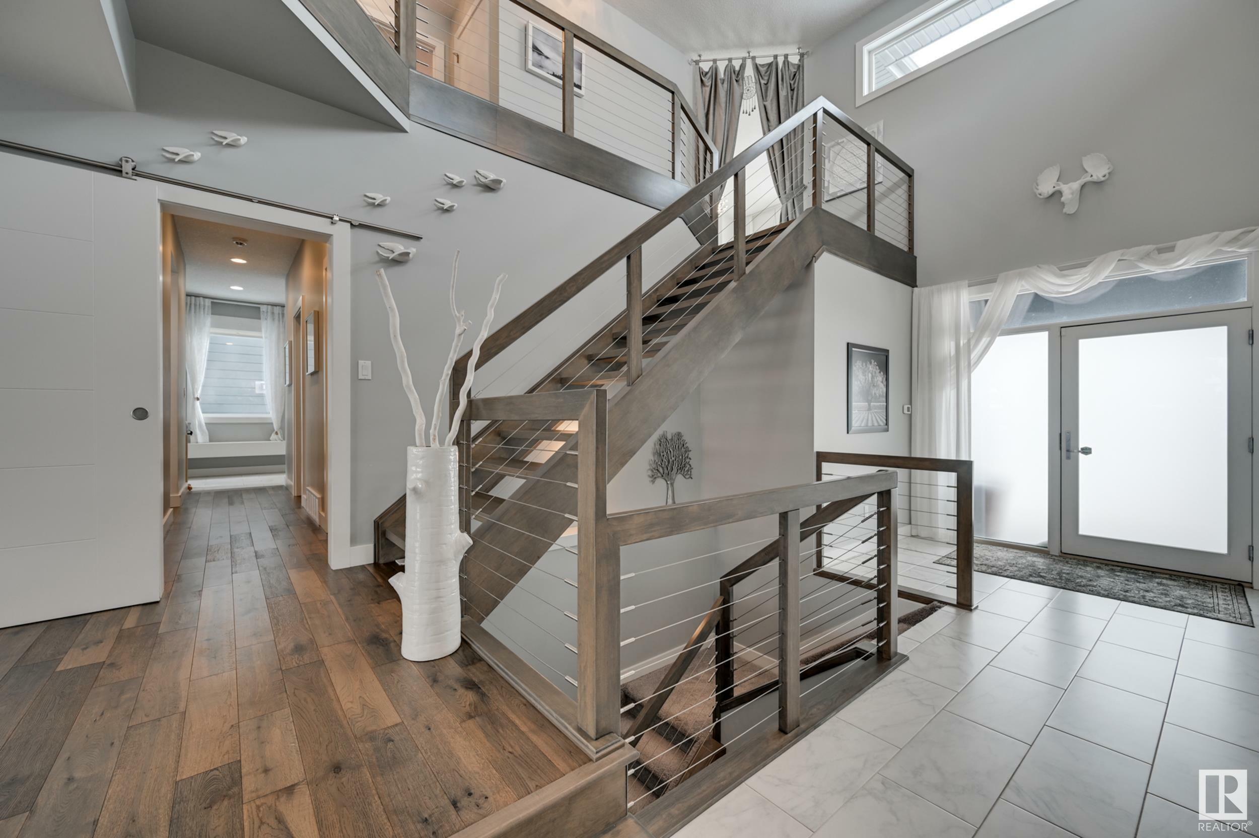 Property Photo: 1311 Hainstock Way SW AB T6W 3B6