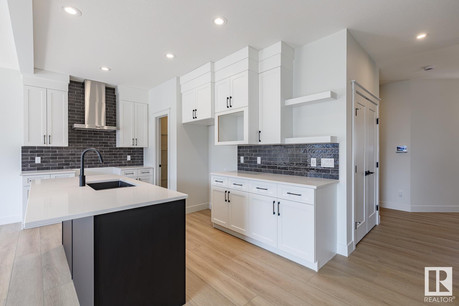 Property Photo: 15679 18 Avenue SW AB T6W 5E1