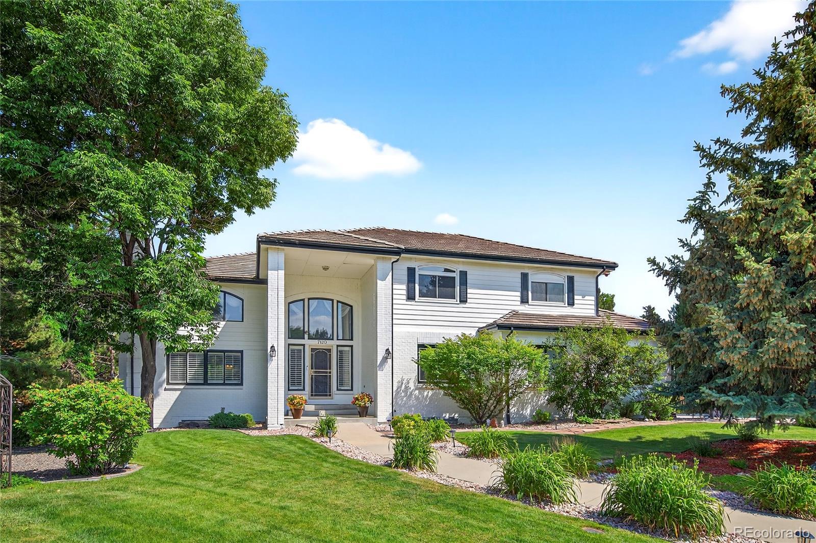 Property Photo: 7120 W Princeton Avenue CO 80235