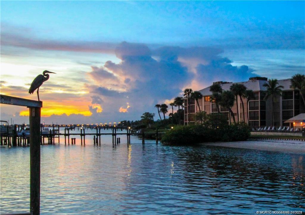 Property Photo: 4620 NE Sandpebble Trace 4-105 FL 34996