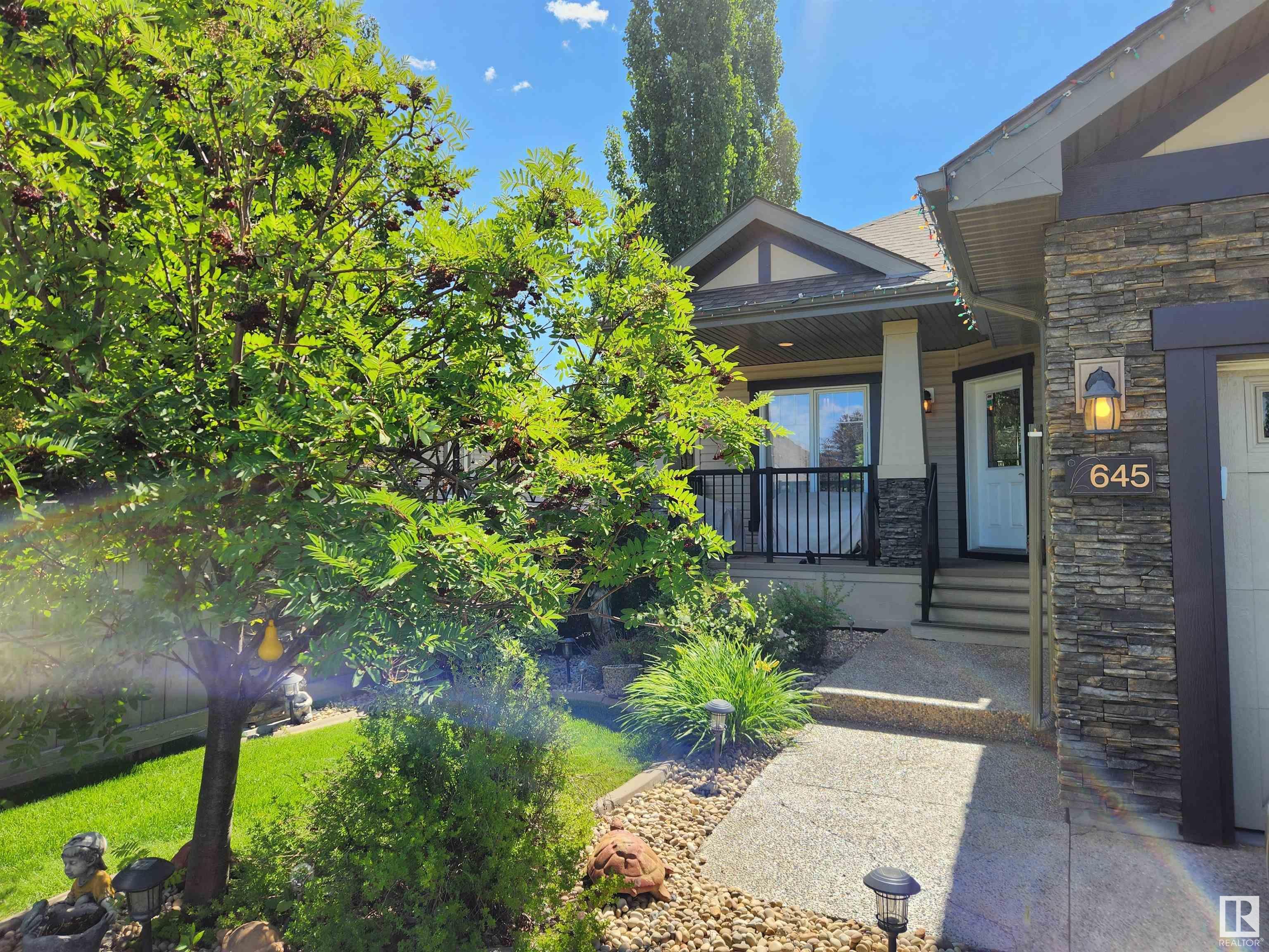 Property Photo: 645 Cantor Landing SW AB T6W 0V6