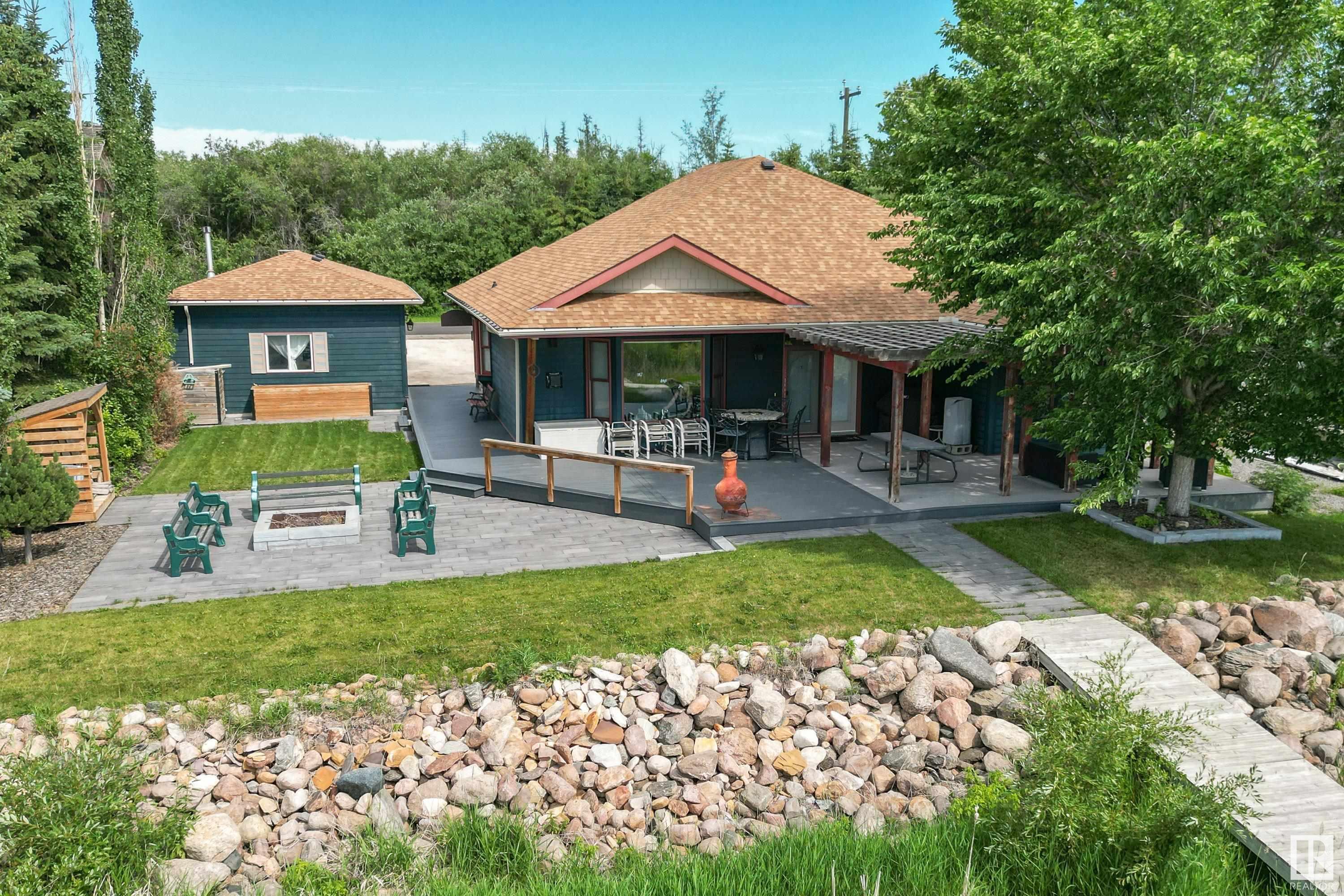 Property Photo: 103 Argentia Beach SE AB T0C 2C0