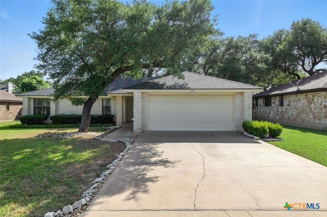 Property Photo:  303 Woodstone Drive  TX 78628 