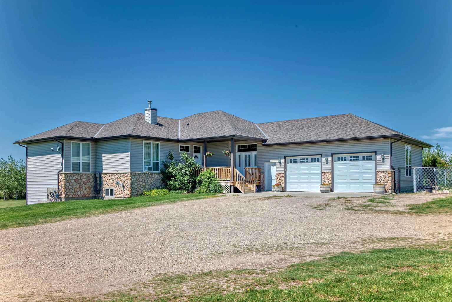 Property Photo: 263101 Range Road 14 AB T4B 3L5