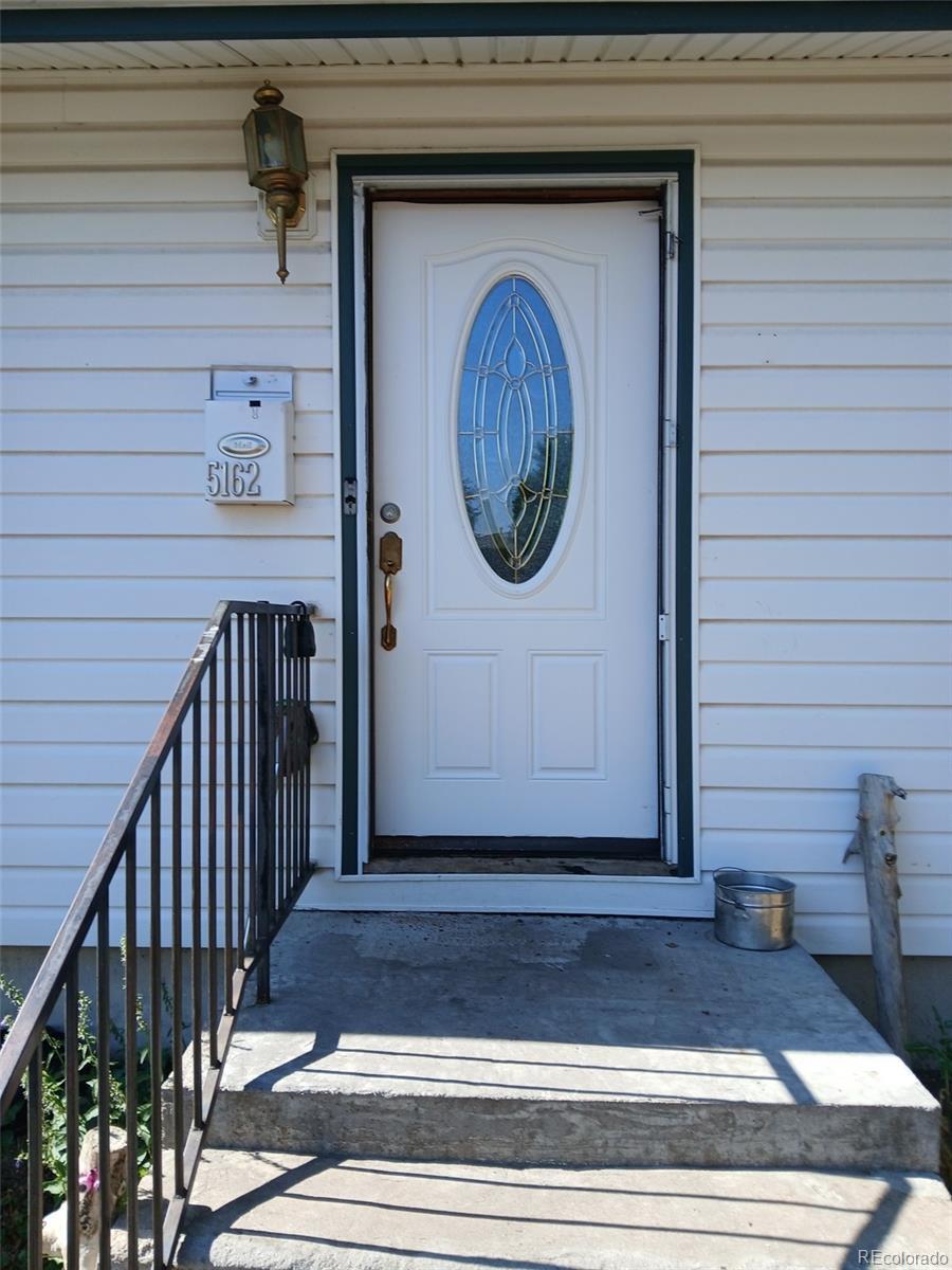 Property Photo: 5162 W Nevada Place CO 80219