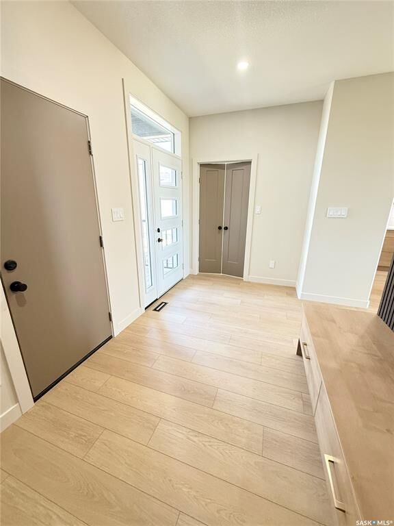 Property Photo: 161 Delaet Drive SK S4H 3B9