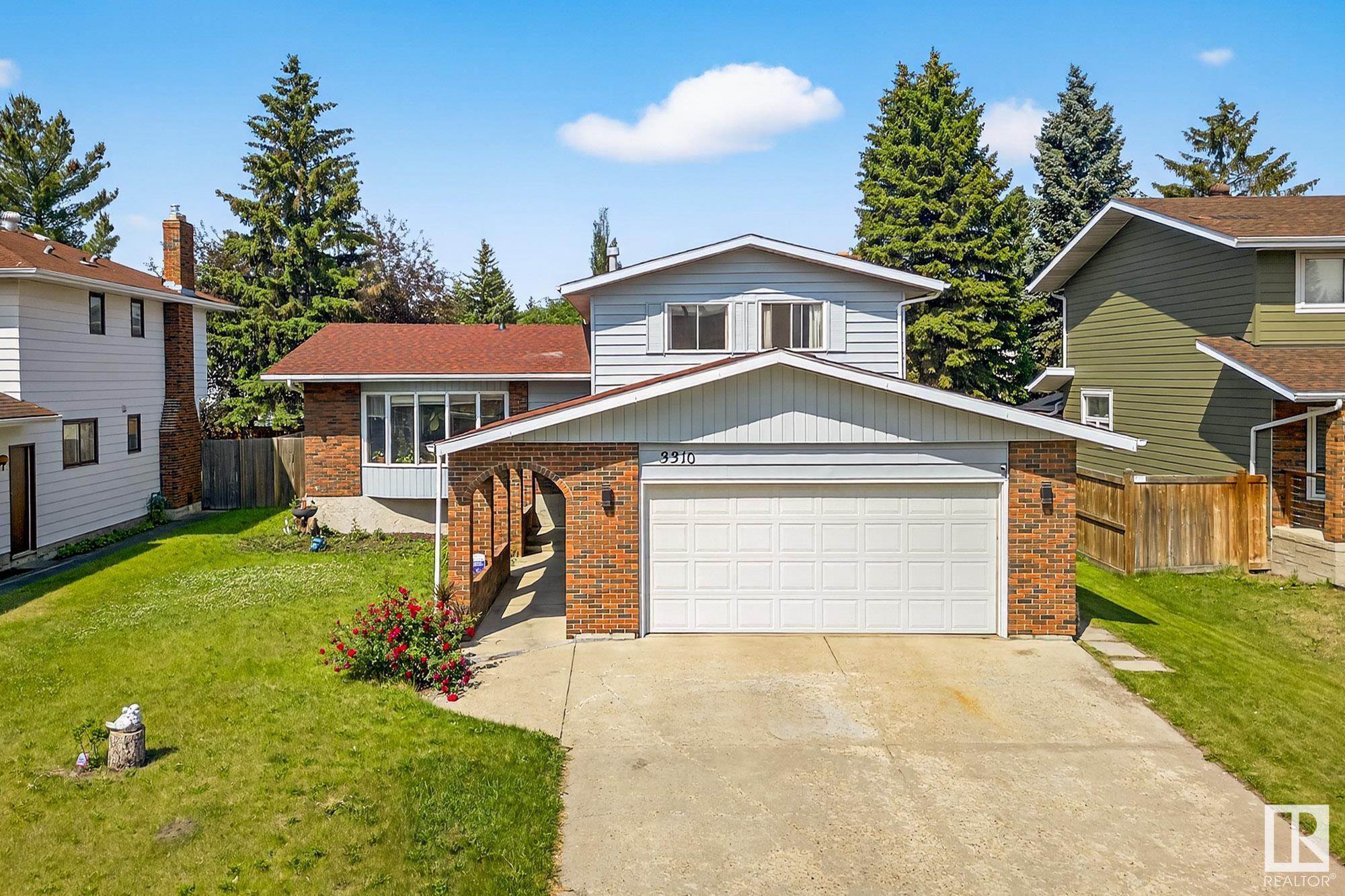 Property Photo:  3310 113A Street NW  AB T6J 3V8 