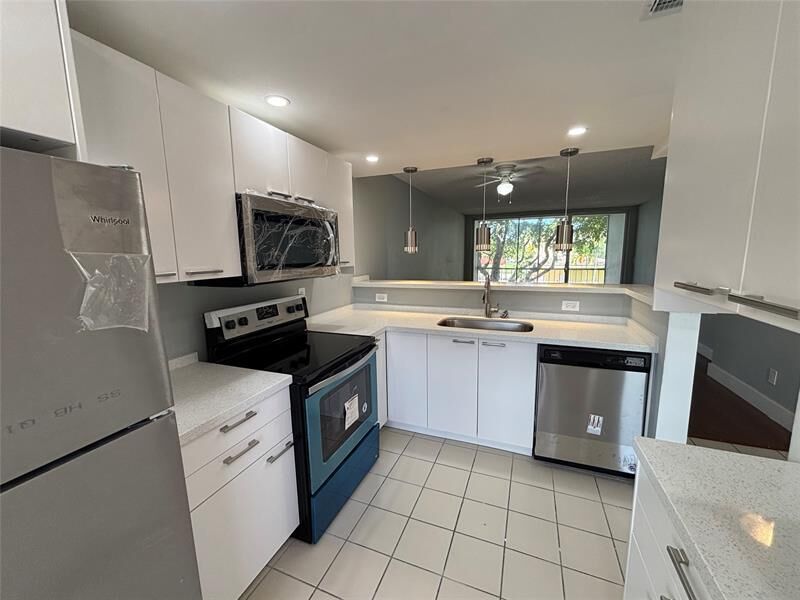 Property Photo: 6000 NW 64th Ave 211 FL 33319