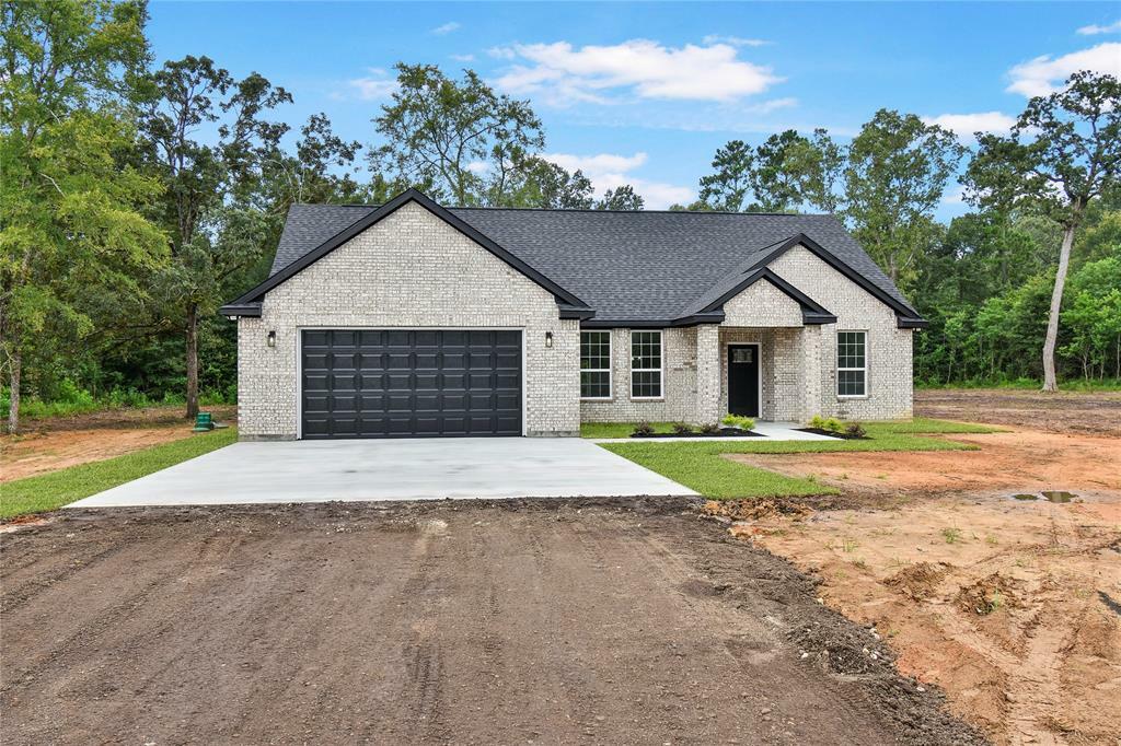 Property Photo: 160 Jackson Road TX 77331