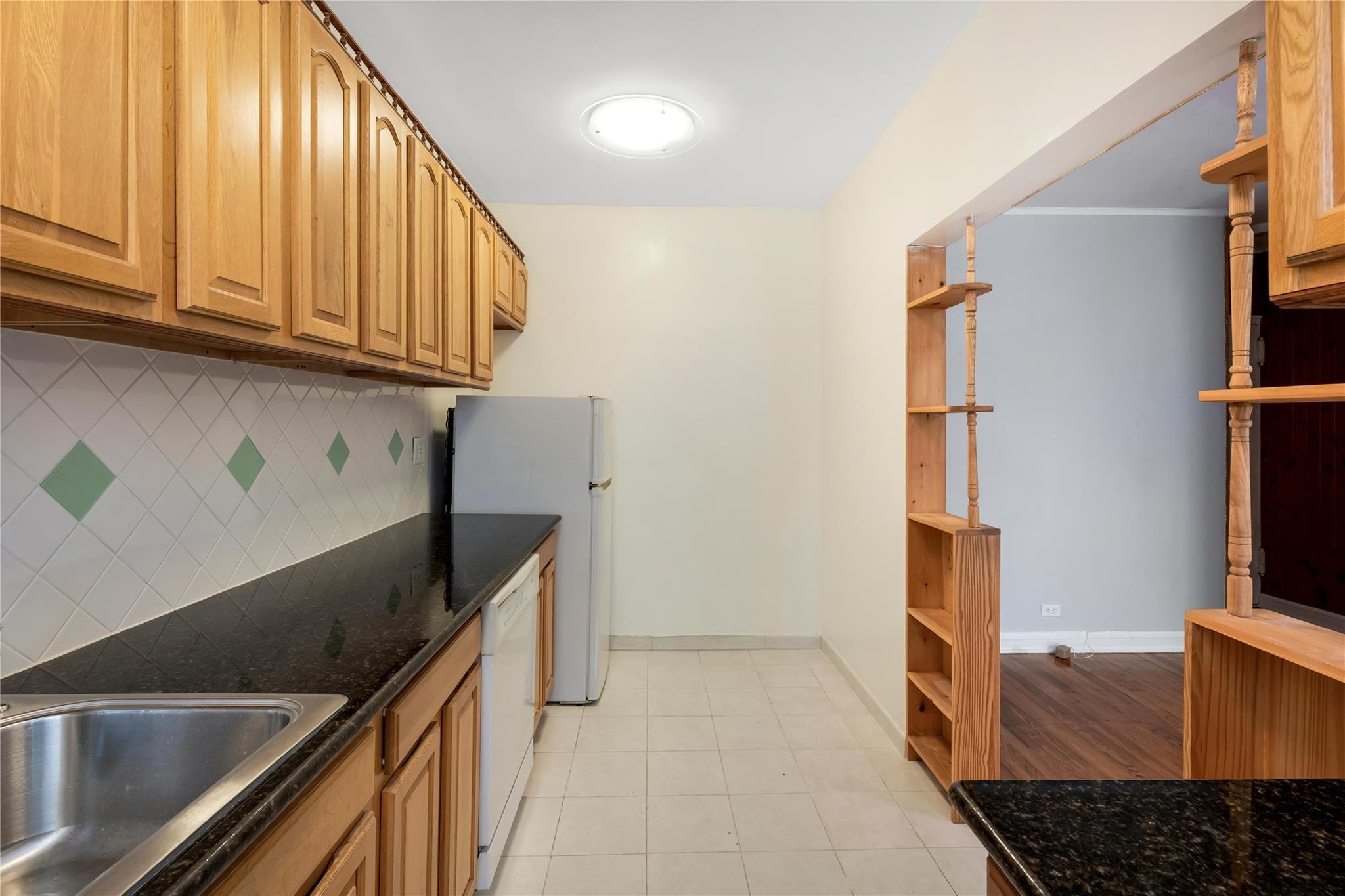 Property Photo:  76-12 Ditmars Boulevard B3  NY 11370 
