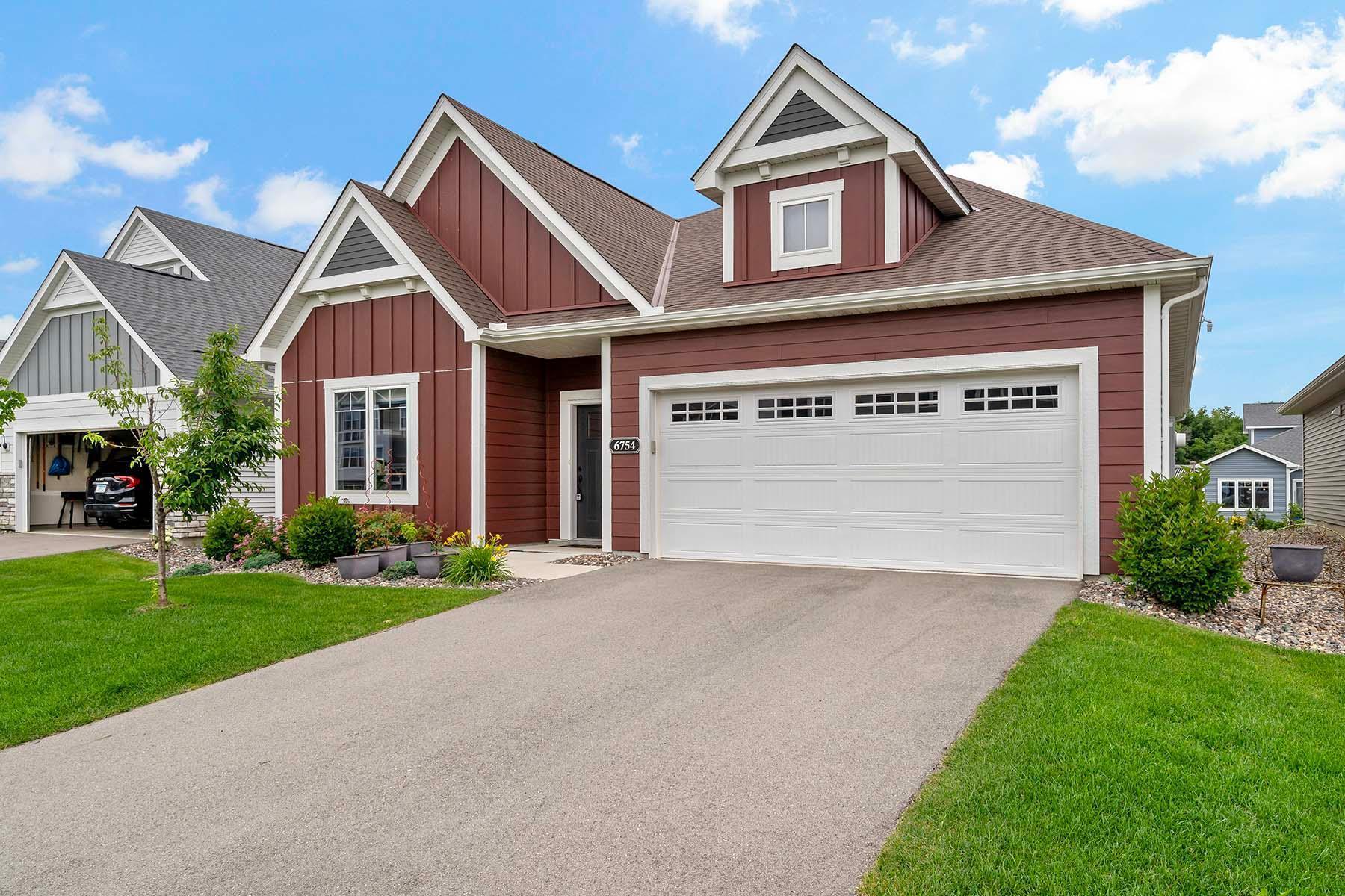 Property Photo:  6754 Woodland Cove Boulevard  MN 55331 