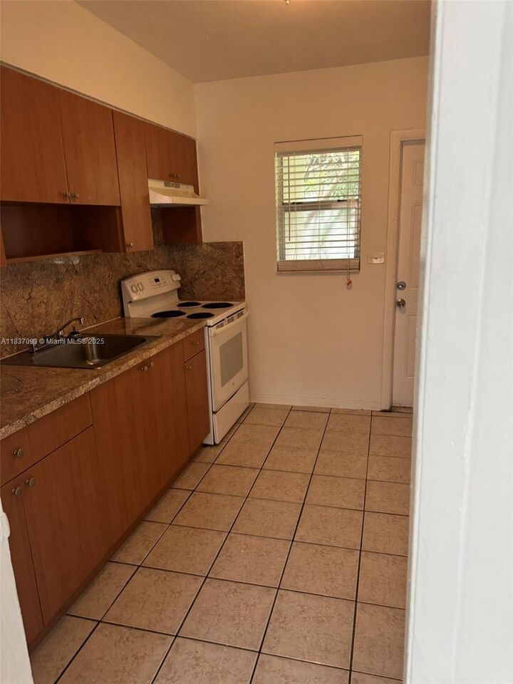 Property Photo: 1857 NW 43rd St 1857 FL 33142
