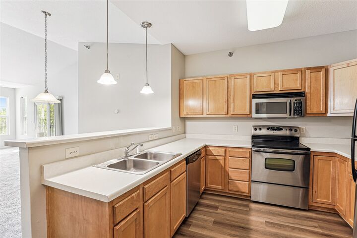 Property Photo:  1313 SE University Avenue 206  IA 50263 
