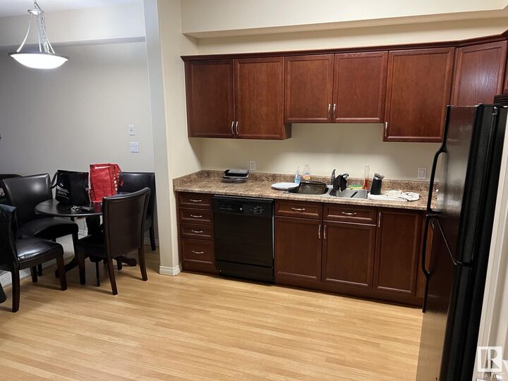 Property Photo: 8702 Southfort Drive 312 AB T8L 4R6