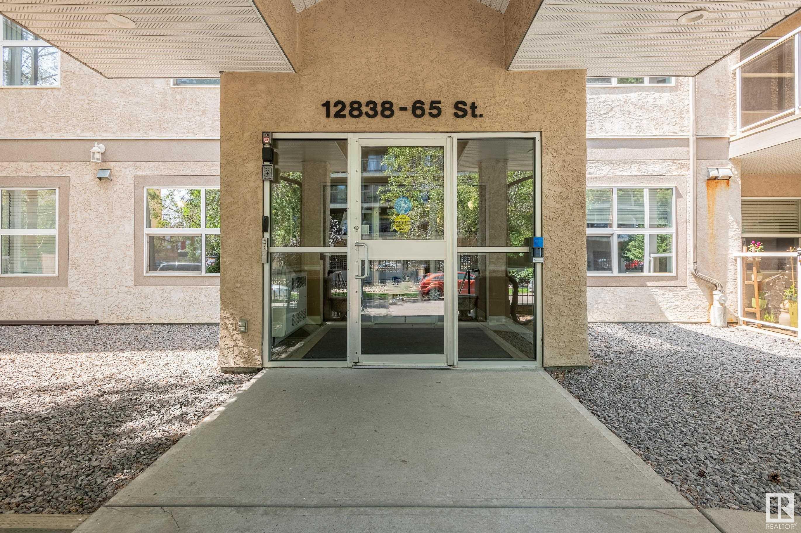 Property Photo:  12838 65 Street NW 106  AB T5A 5H3 
