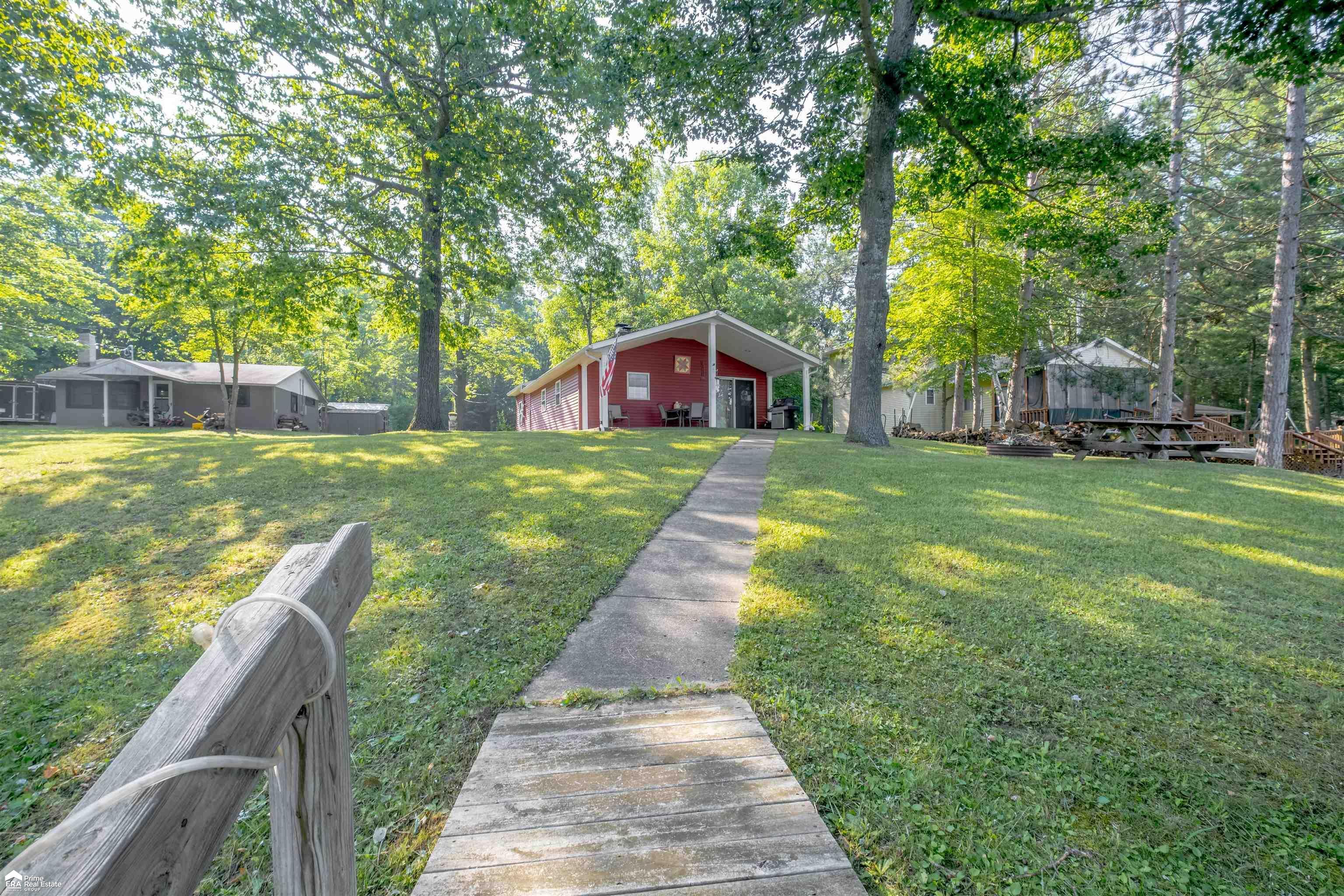 Property Photo:  4779 E Shore Drive  MI 48610 